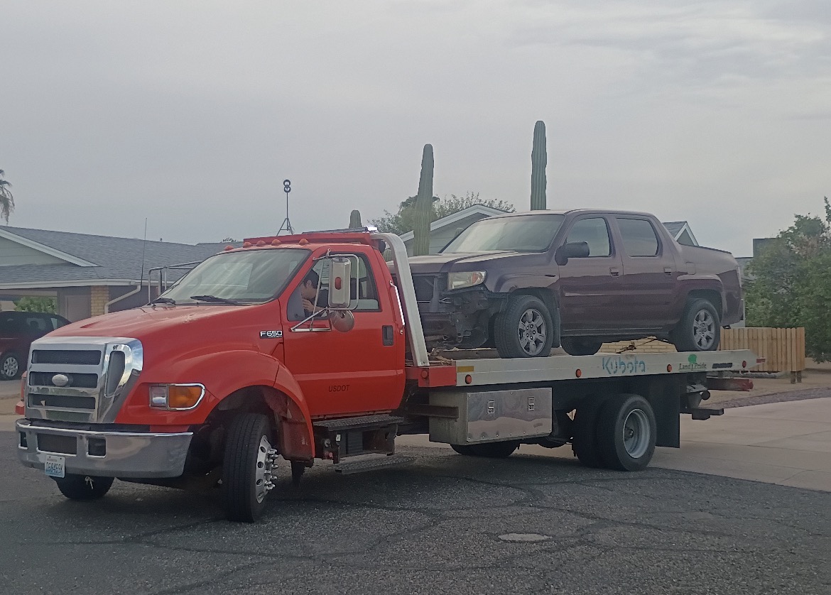 JT & Sons Towing flatbed truck